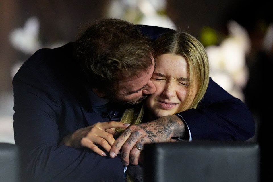 David Beckham kissed daughter Harper on the cheek before kick-off