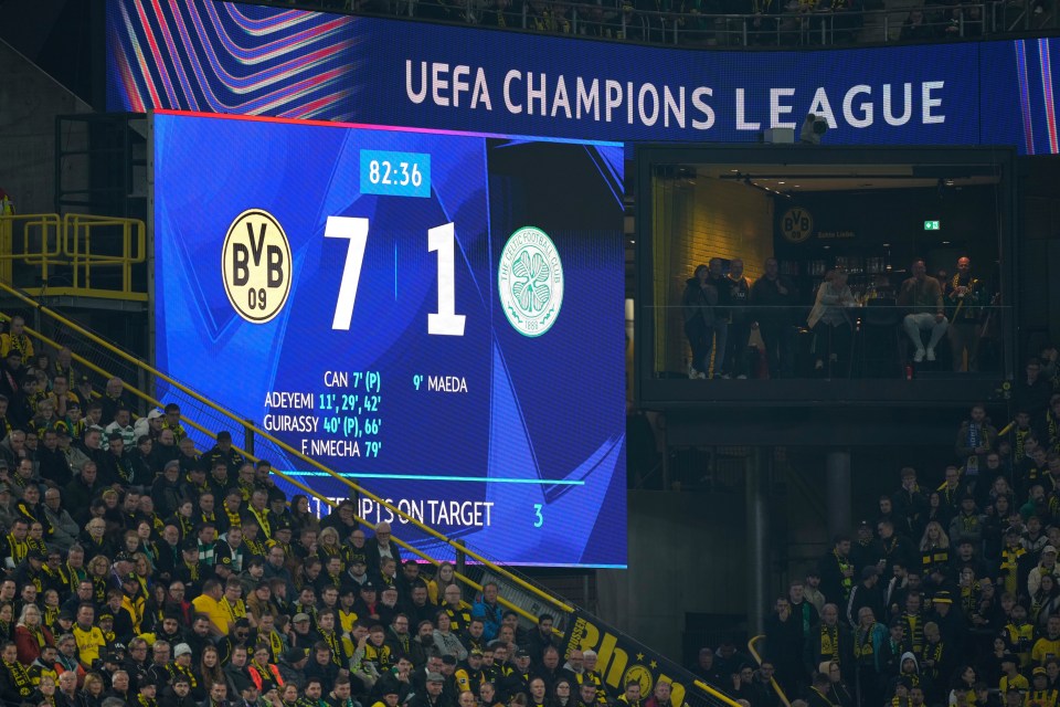 a scoreboard for the uefa champions league shows the score of 71 to celtic