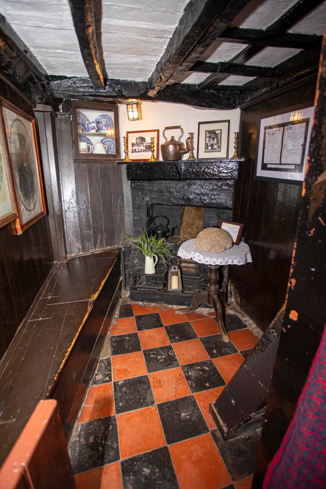 a room with a black and white checkered floor