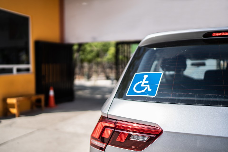 Sign of disabled car person