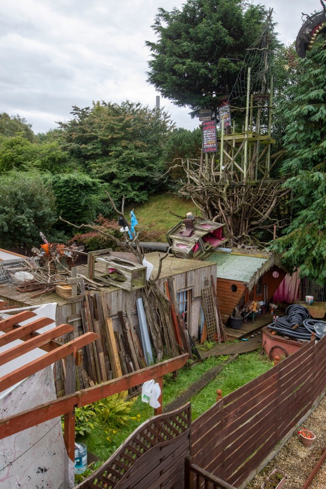 Carbonaro's front and back gardens are piled high