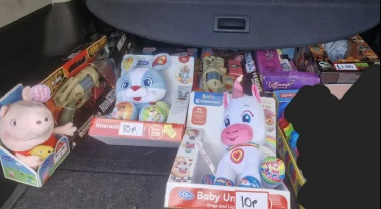 a facebook post by louise webb shows a bunch of toys in the back of a car