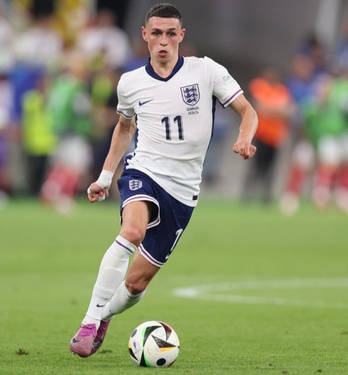 FRANKFURT AM MAIN, GERMANY - JUNE 20: Phil Foden of England during the UEFA EURO 2024 group stage match between Denmark and England at Frankfurt Arena on June 20, 2024 in Frankfurt am Main, Germany. (Photo by Catherine Ivill - AMA/Getty Images)