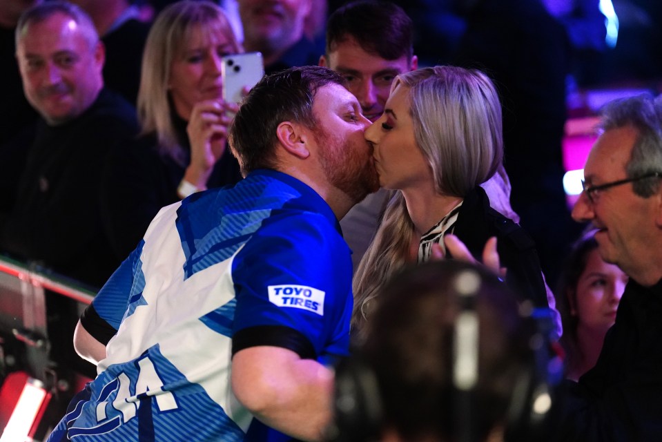 Menzies is dating fellow darts star Fallon Sherrock