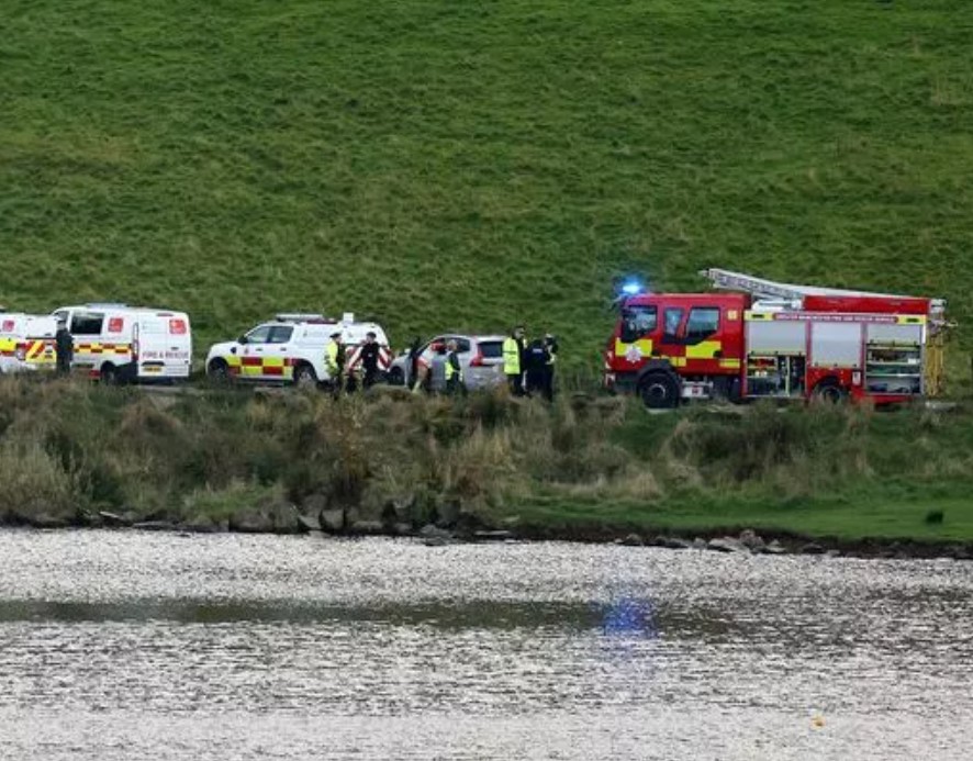 Emergency services searching for a person in the water