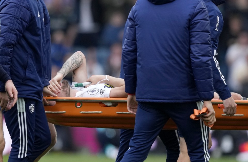 The Leeds star was in tears on the field as he was stretchered off