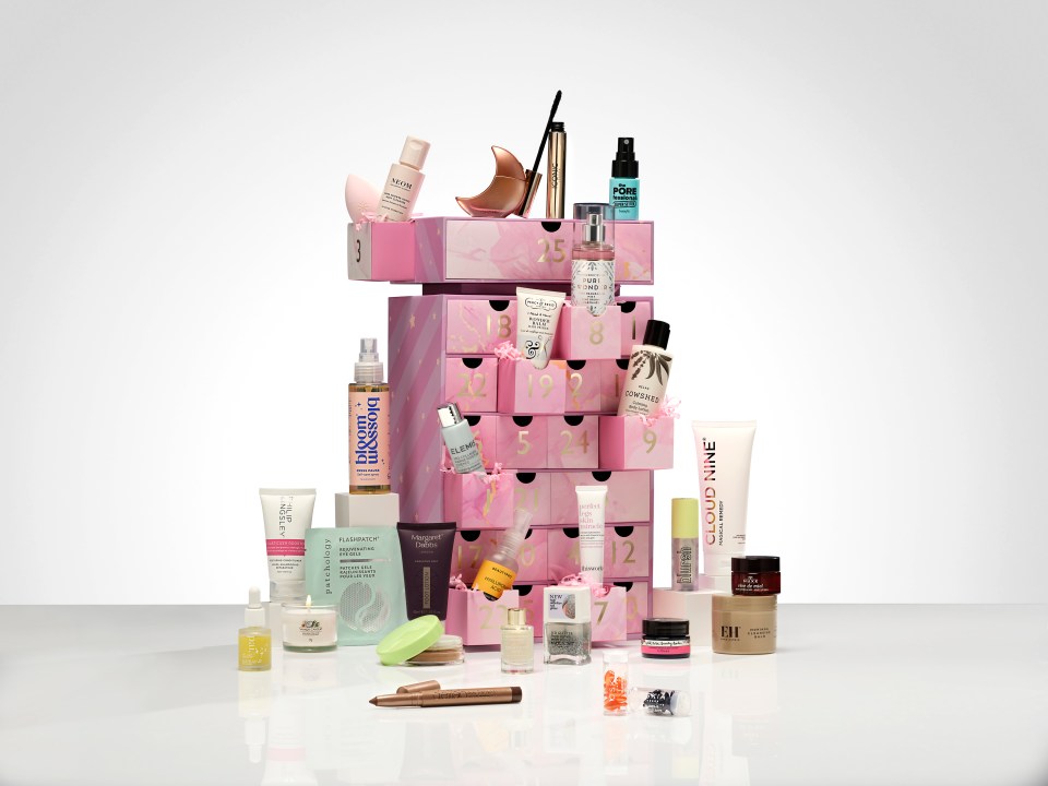 a display of beauty products including cloud nine