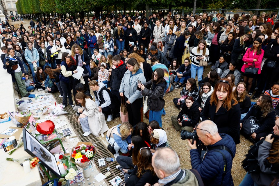 Fans gather and place tributes to the former One Direction singer in the Tuilleries Garden, Paris, France, today