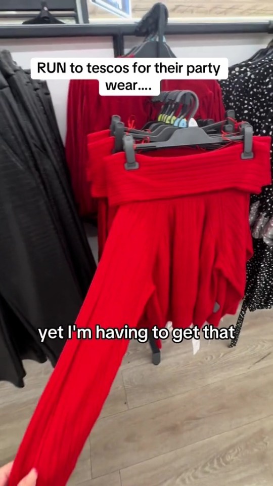 This red, off-the-shoulder top went straight in her basket