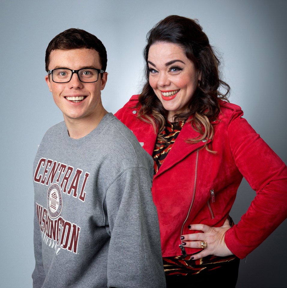 a man wearing a central washington sweatshirt stands next to a woman