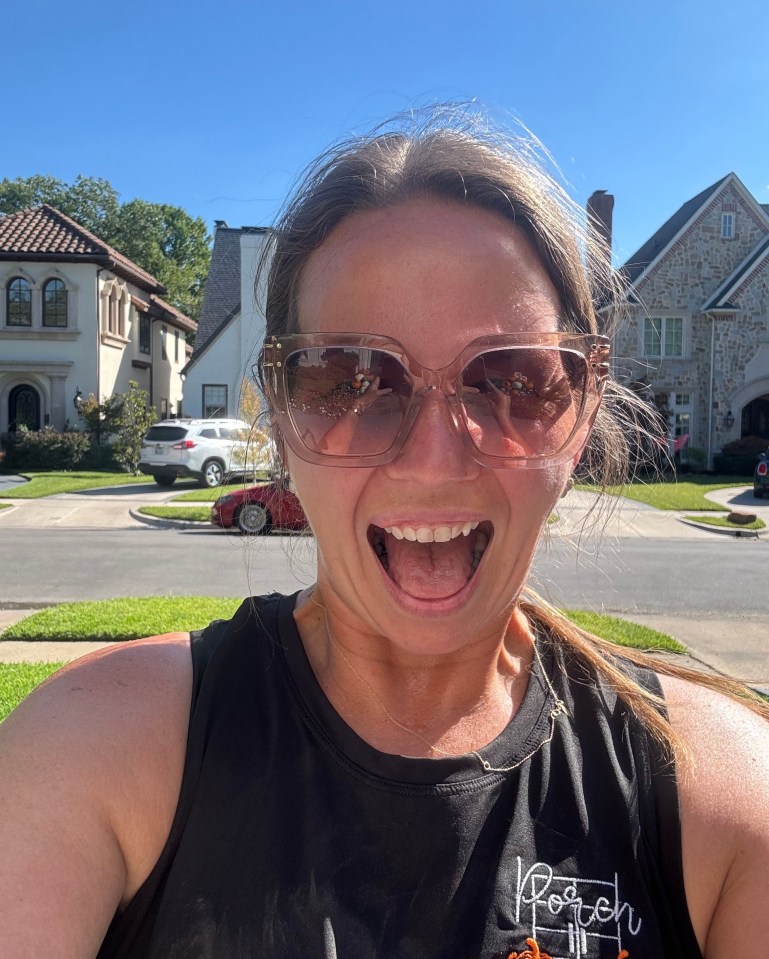 a woman wearing sunglasses and a shirt that says porch