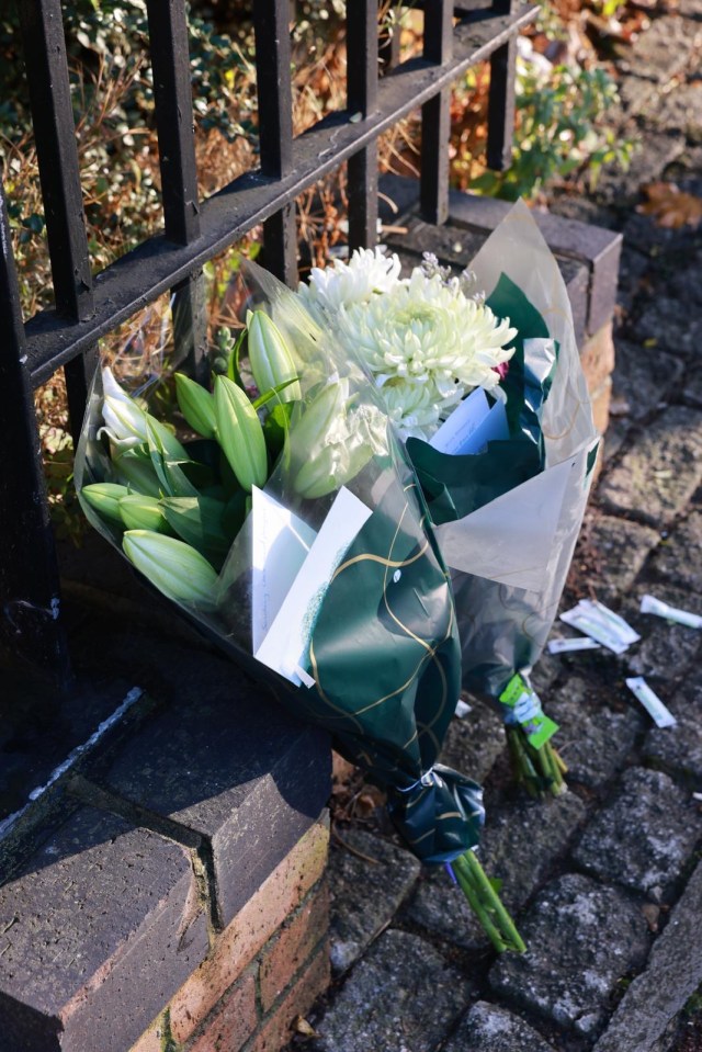 Floral tributes have been left at the scene