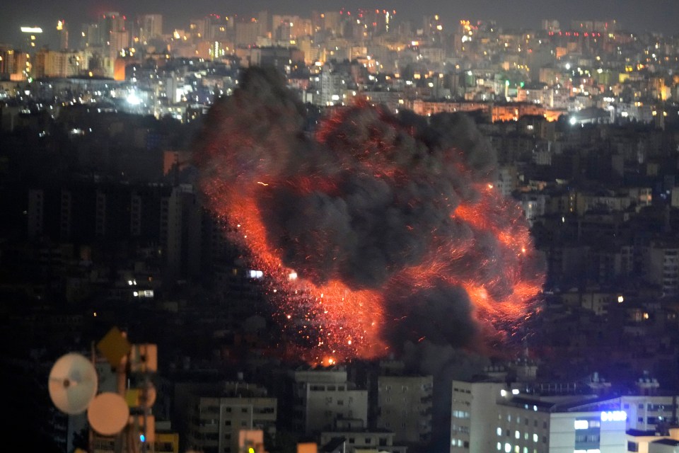 Flame and smoke rises from an Israeli airstrike on Dahiyeh, in Beirut, early this morning