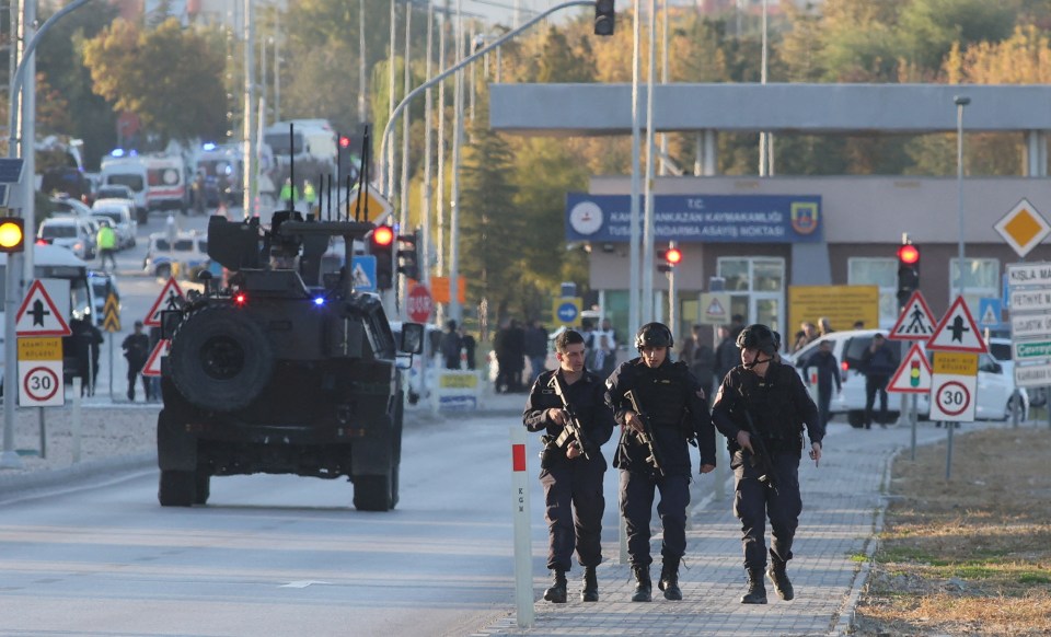 a group of soldiers are walking down a street in front of a sign that says 30