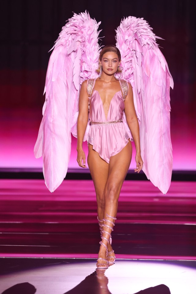 Gigi Hadid wore a thin pink gown on the runway