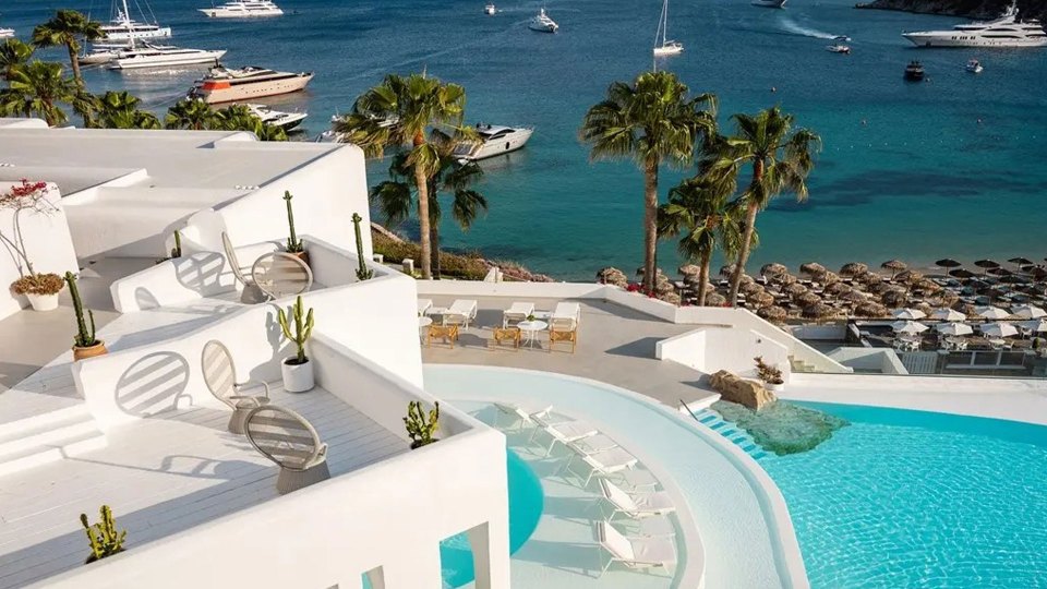 Aegean blues … Grecotel Mykonos Blu Boutique Resort overlooks the beach