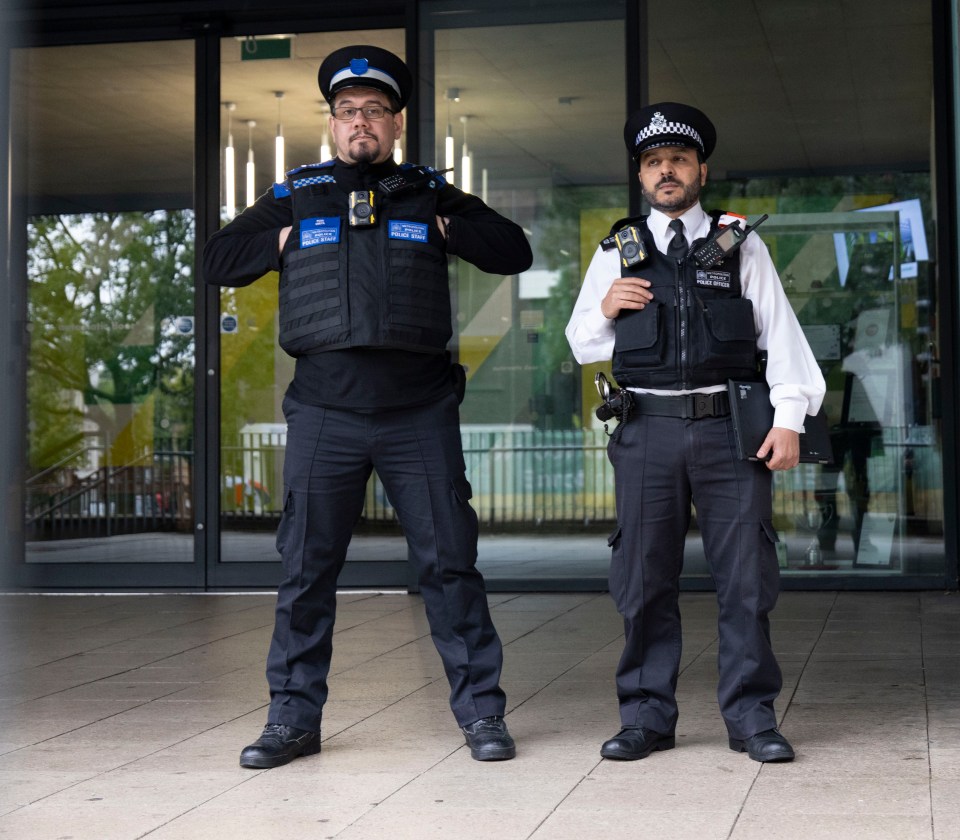 Cops outside the school this morning as a crime scene remains in place