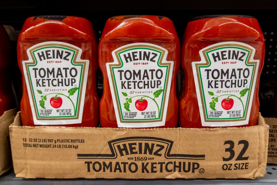 a box of 32 oz bottles of heinz tomato ketchup