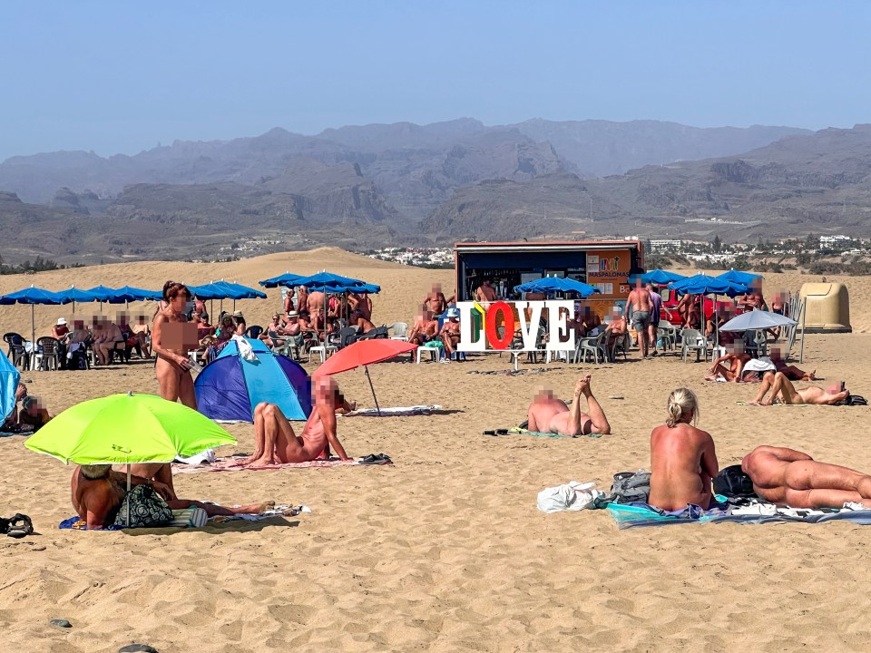 the word love that is on a beach