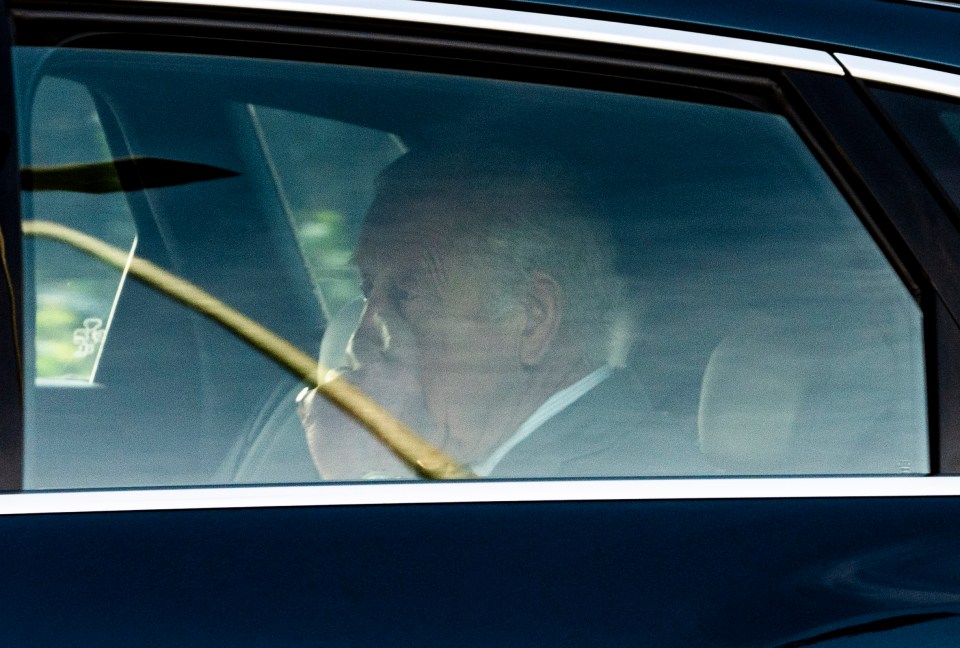 King Charles snapped on his way to Heathrow for the trip