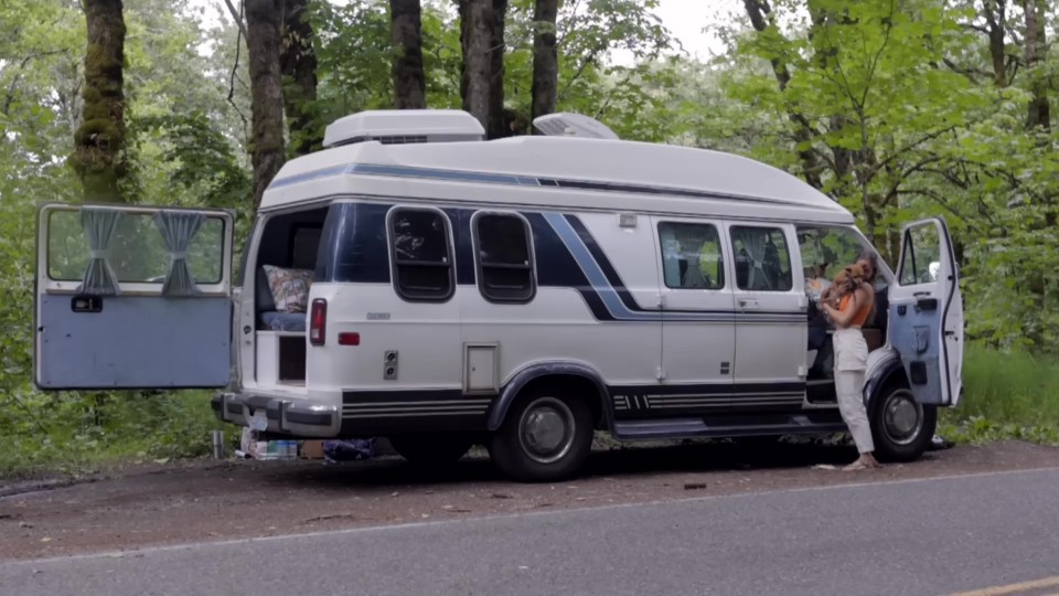 a white van with the number 311 on the side