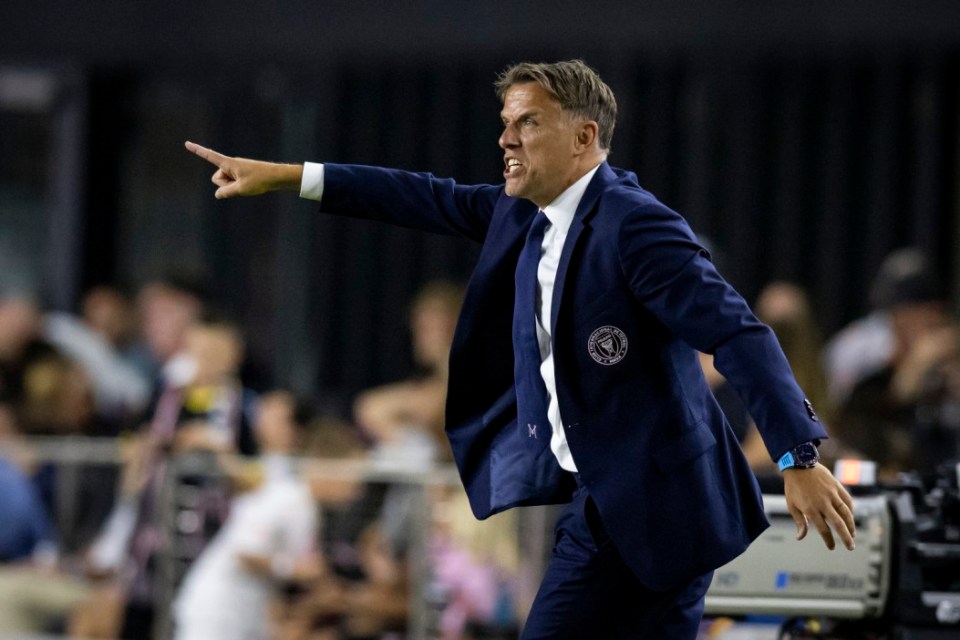 FORT LAUDERDALE, FL - APRIL 08:  Phil Neville Heads Coach of Inter Miami CF gives instruction to his team from the sidelines during the National Anthem prior to the Major League Soccer match against FC Dallas at DRV PNK Stadium on April 8, 2023 in Fort Lauderdale, Florida. (Photo by Ira L. Black - Corbis/Getty Images)