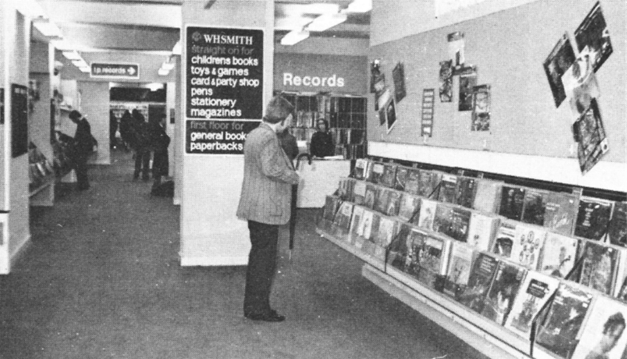 a black and white photo of a store called whsmith