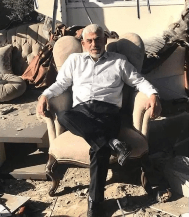 Hamas leader in Gaza Yahya Sinwar sits in his bombed Gaza office, May 27, 2021