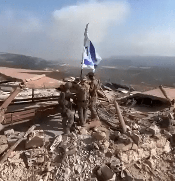 The moment Israeli troops raised flags at the destroyed site of a Hezbollah theme park