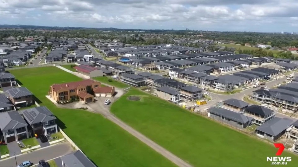 Their stunning 200 metre-long lawn takes two hours to mow and could fit up to 50 of the newbuilds inside