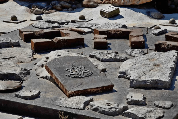 Replica war scenes feature destroyed Israeli tanks and toppled gravestones