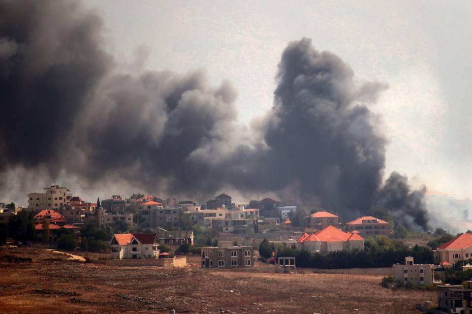 Smoke rises from a Lebanese village after an Israeli airstrike on Khiam and Kfar Kila