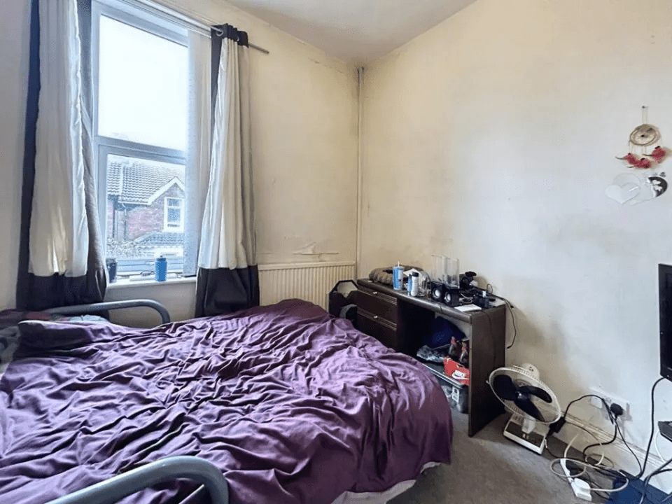 The second bedroom is also situated at the front of the flat