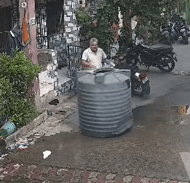 The woman was completely covered inside the tank