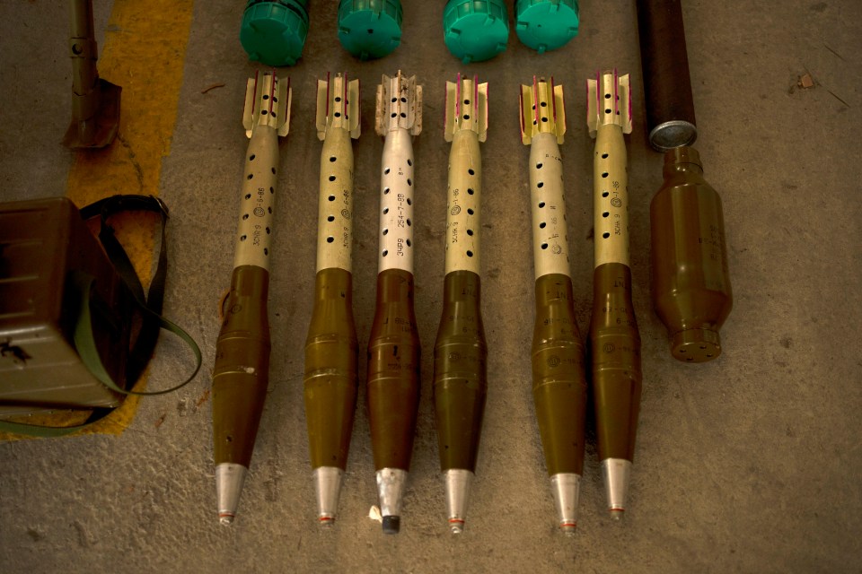 The Israeli Defense Forces displayed weapons seized in on a base in southern Israel