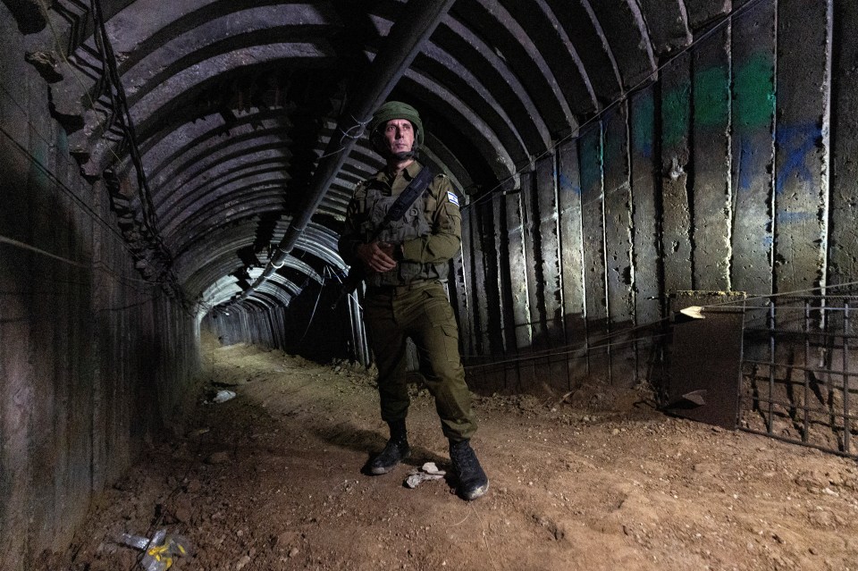 Israeli military spokesperson Rear Admiral Daniel Hagari stands in an iron-girded tunnel designed by Hamas