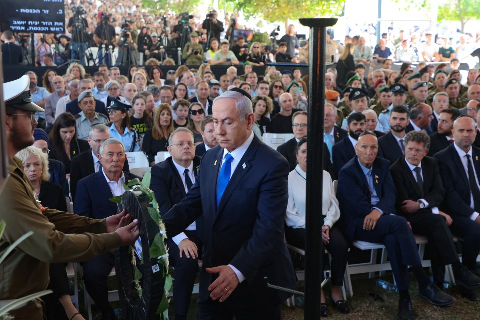 Israel’s Prime Minister Benjamin Netanyahu takes part in a ceremony marking a national day of mourning for the October 7 victims today