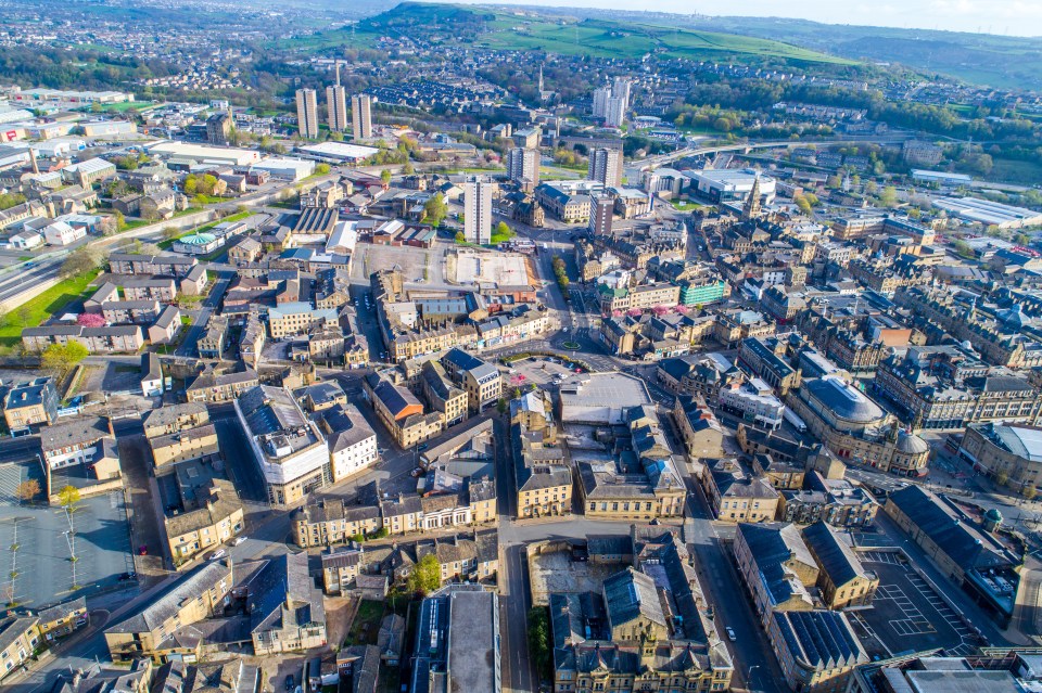 an aerial view of a city with lots of buildings