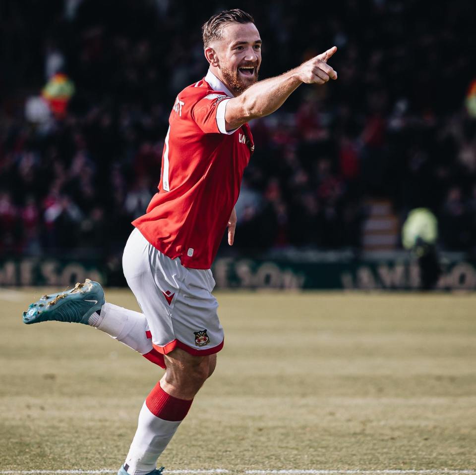 Jack Marriott celebrates scoring vs Northampton, leaving Wrexham second in League One and eyeing a third straight promotion