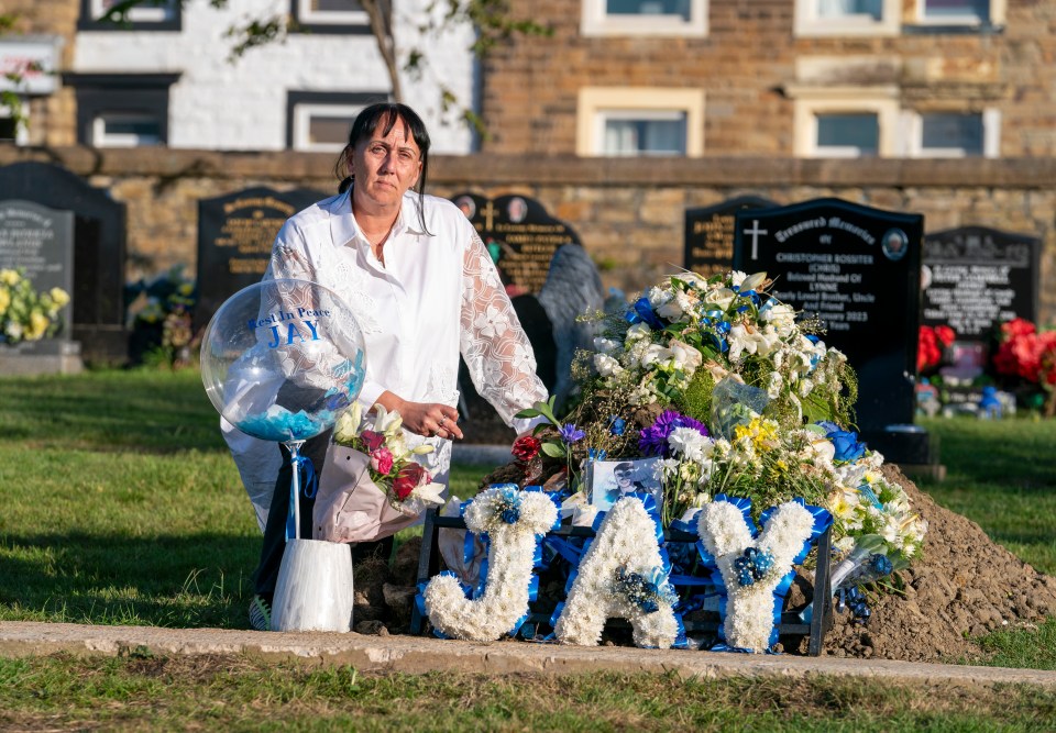 Debbie at Jay's grave