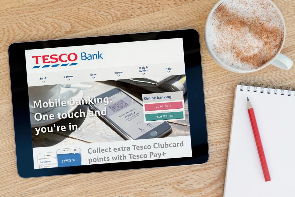 a tablet is open to the tesco bank website