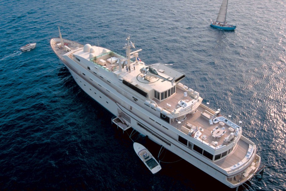 an aerial view of a large yacht in the ocean