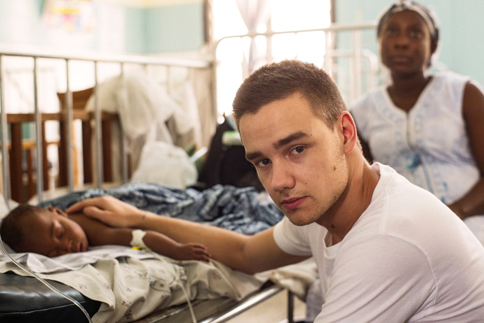 Caring Liam Payne visiting sick children in a paediatric ward in Ghana in 2013