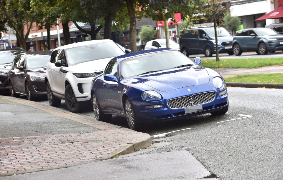 The sought-after road in Wilmslow, Cheshire, is full of posh cars