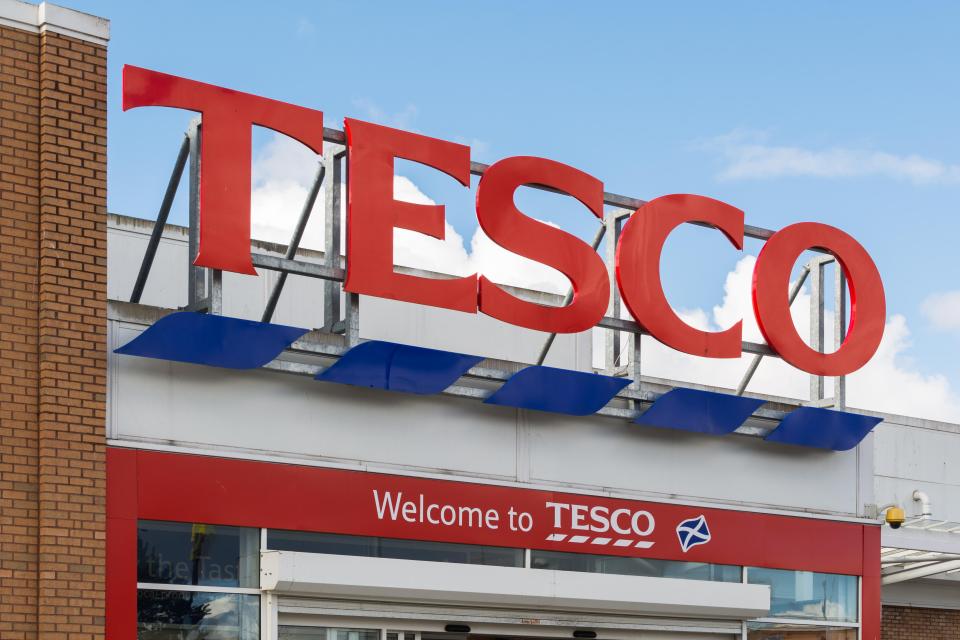 a tesco store with a welcome to tesco sign