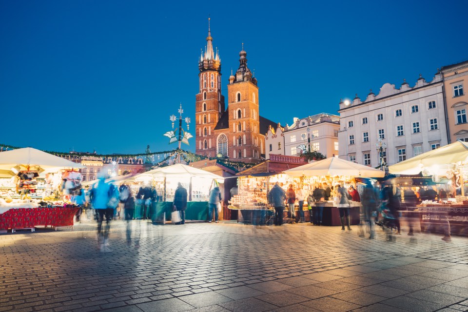 Tourists can take a horse and carriage ride around Krakow's main square