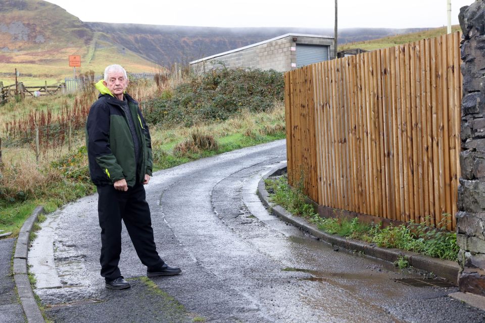 Fred Tucker, 84, has slammed his neighbour's 6ft privacy fence