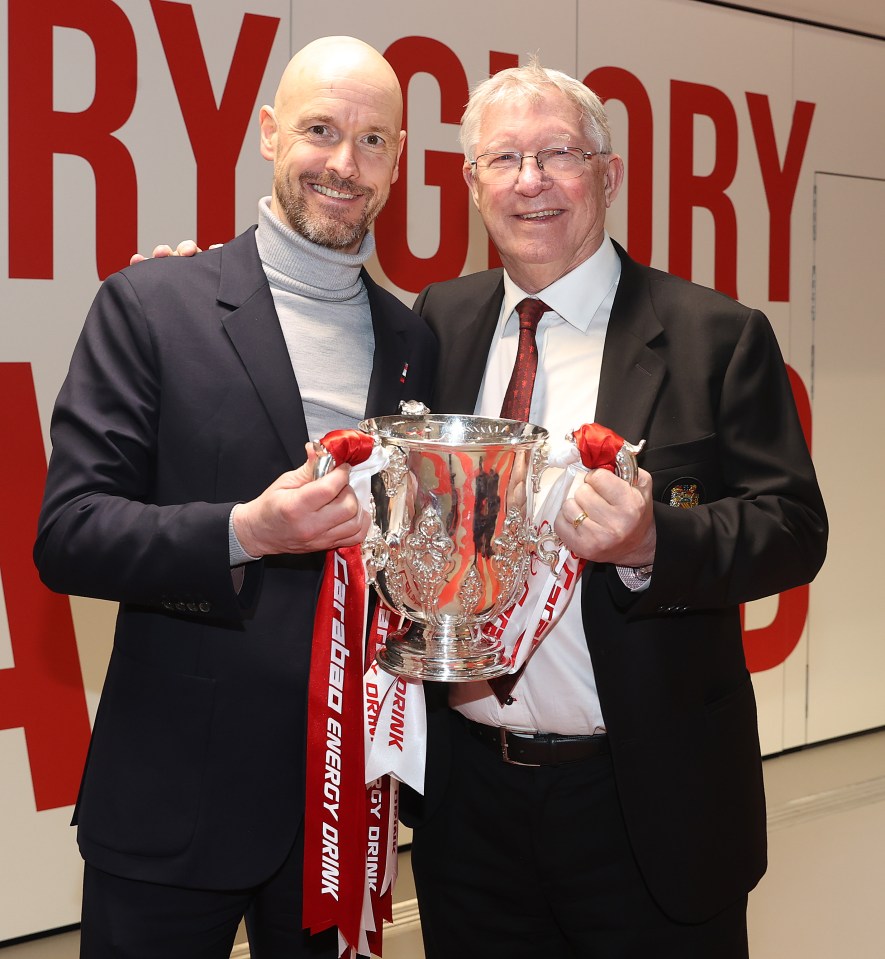 The two managers celebrating Man Utd's League Cup triumph together