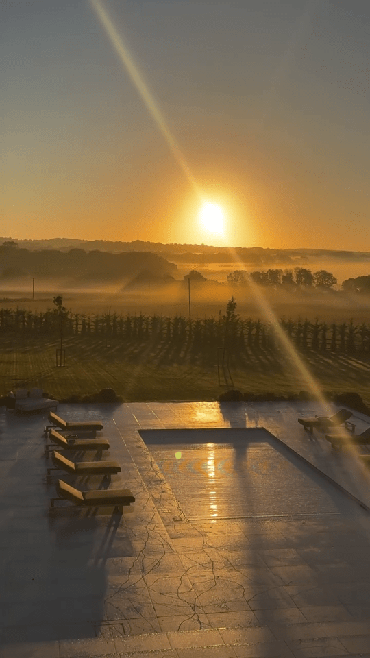 The stunning sunrise overlooking the wealthy couple's home