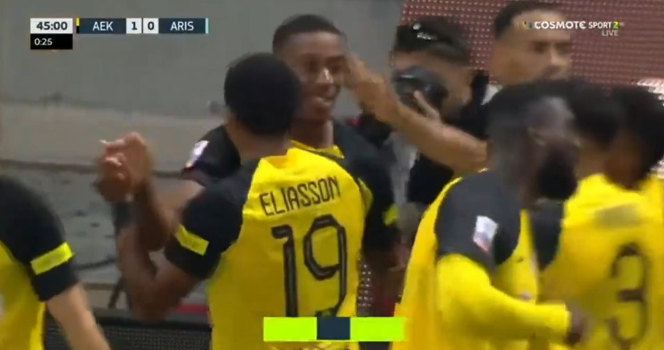 Anthony Martial celebrates opening his AEK Athens account